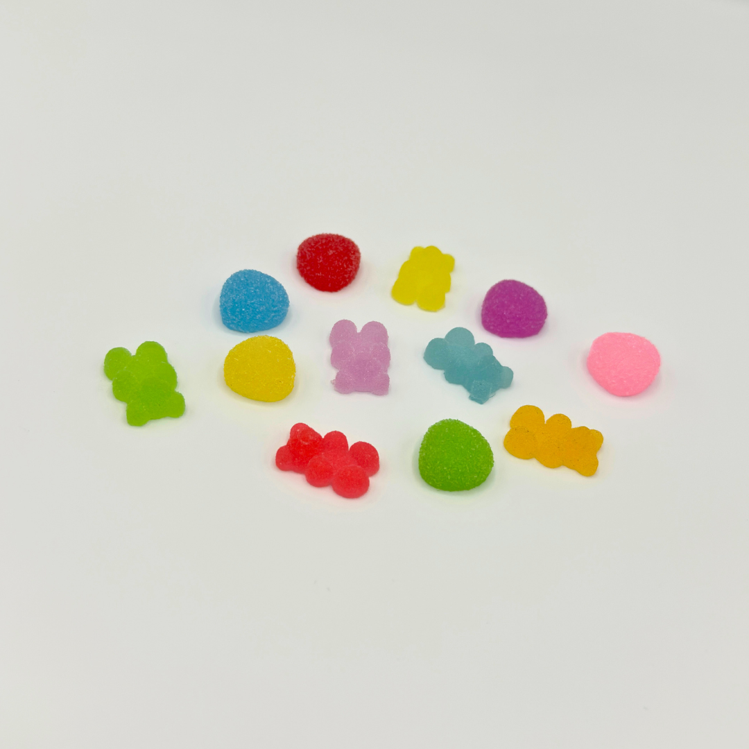 Kleine zachte snoepvormen met suikertextuur, in felle kleuren voor creatief spel